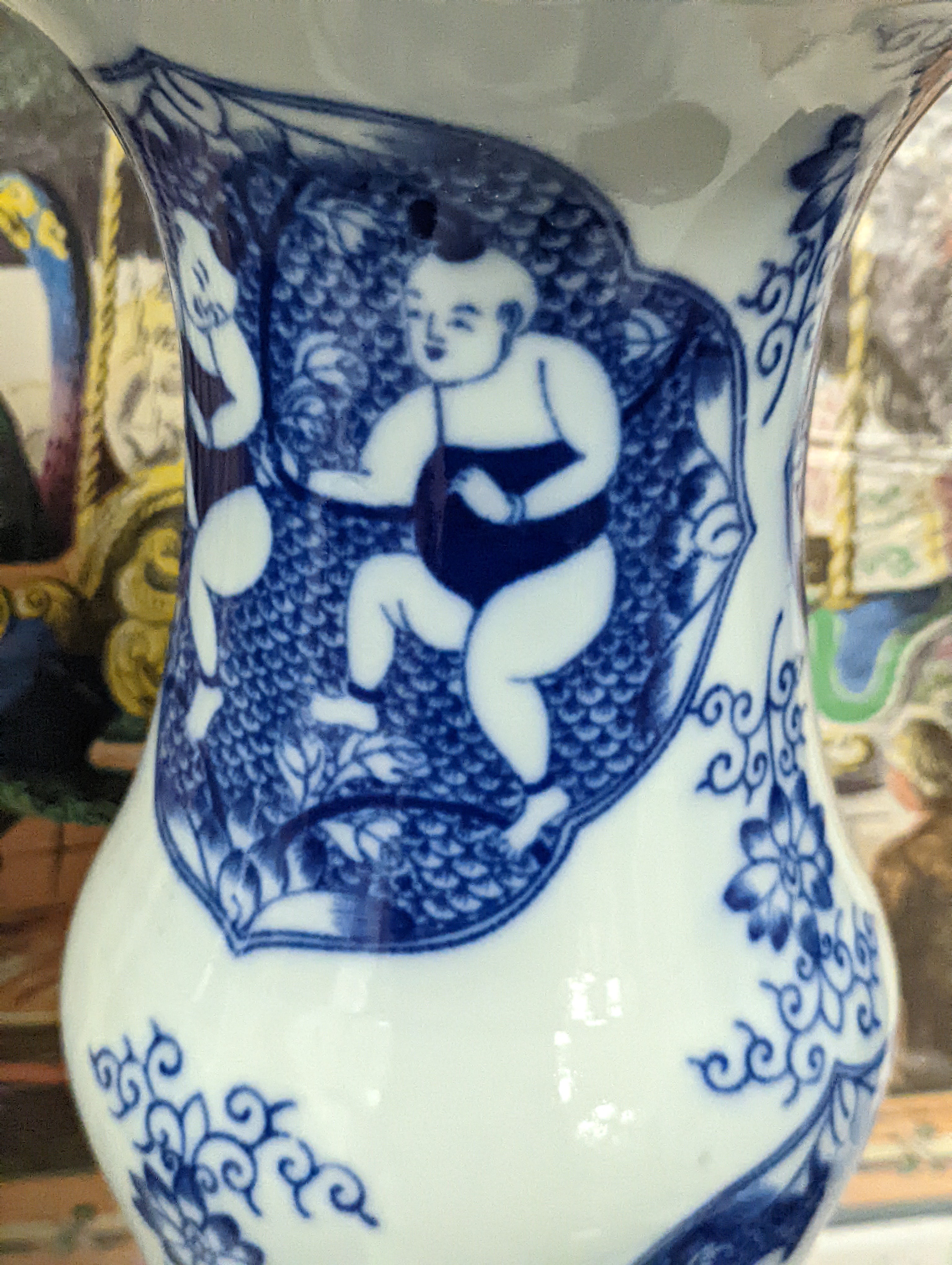 A pair of Chinese blue and white vases on stands and 6 further wood stands. Vases 35cm